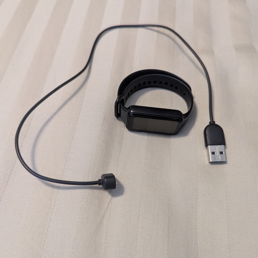 Black Smartwatch with Charger